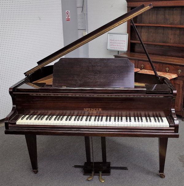 Spencer London, a mahogany iron framed over strung baby grand piano, on tapering square supports, No 88383, 139cm wide x 128cm deep.