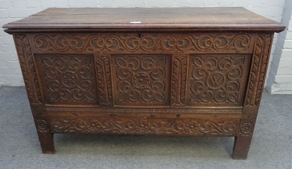 A 17th century and later oak mule chest with single drawer base on stile feet, 132cm wide x 82cm high.