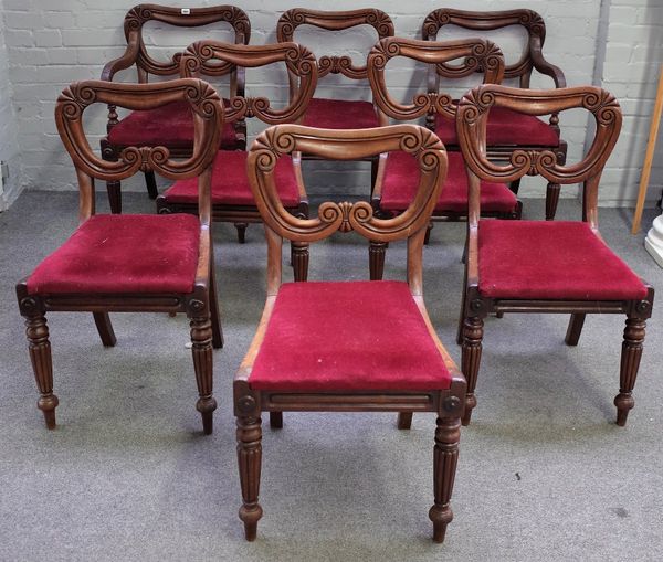 A set of eight William IV mahogany kidney back dining chairs, on tapering reeded supports, to include a pair of carvers, (8)