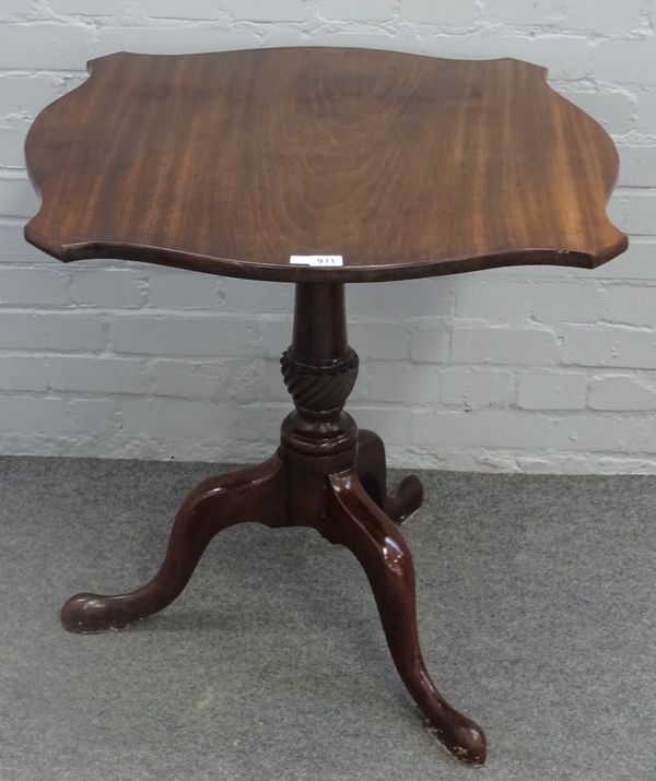 An 18th century and later mahogany occasional table, the shaped snap top on spiral column and tripod base, 72cm high x 83cm wide.