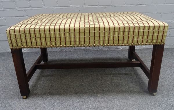 An 18th century and later rectangular footstool, on canted square mahogany supports, 78cm wide x 43cm high.