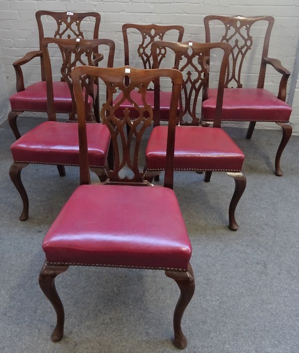 A set of eight George III style mahogany dining chairs, with pierced splat on cabriole supports, to include a pair of carvers, (8).