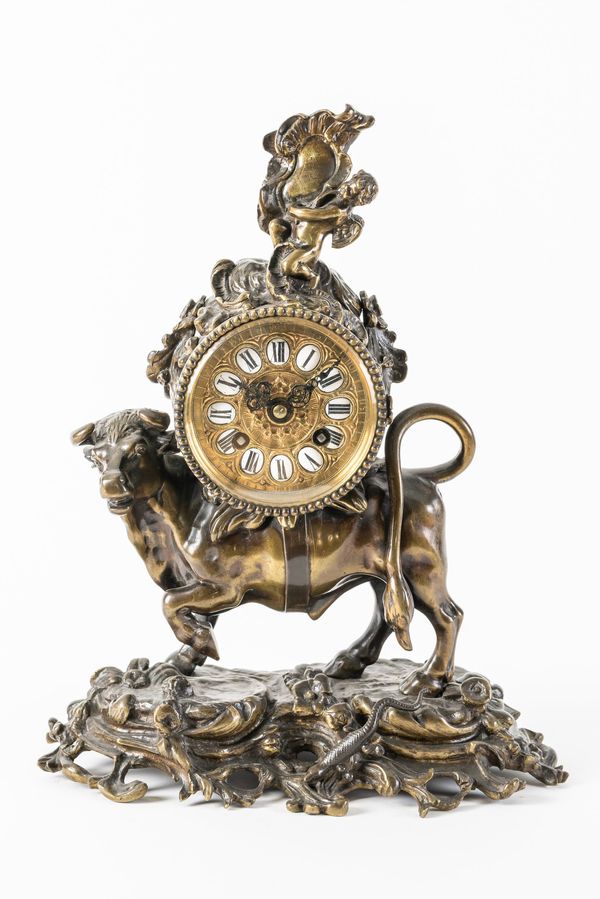 A FRENCH BRONZE MANTEL CLOCK