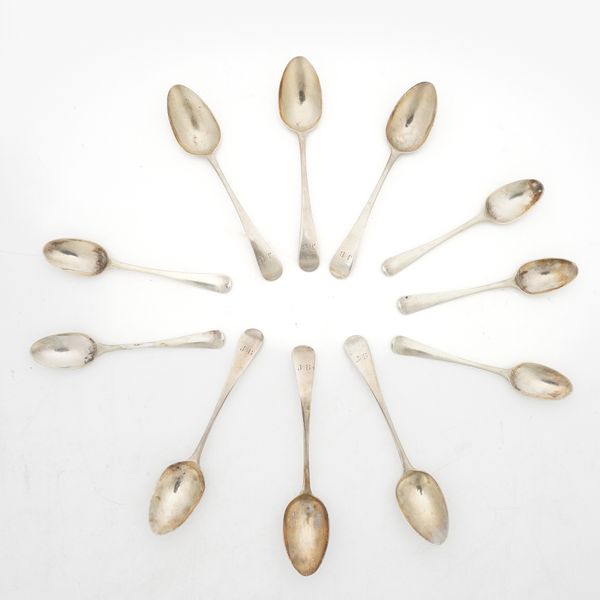 A SET OF SIX SILVER TEASPOONS AND A PART SET OF FIVE SILVER TEASPOONS (11)