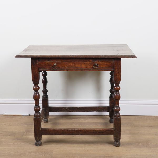 A 17TH CENTURY OAK SINGLE DRAWER SIDE TABLE