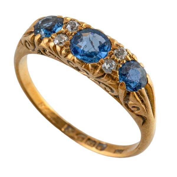 A SAPPHIRE AND DIAMOND RING