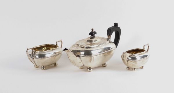 A THREE SILVER PIECE BACHELOR’S TEA SET