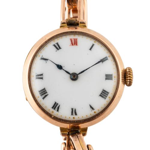 A LADY'S 9CT GOLD DRESS WATCH