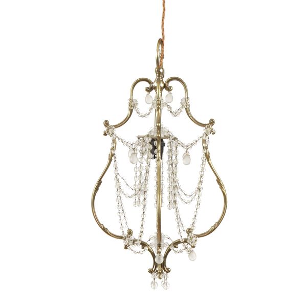 A GILT LACQUERED BRASS PENDANT LIGHT OF CARTOUCHE OUTLINE