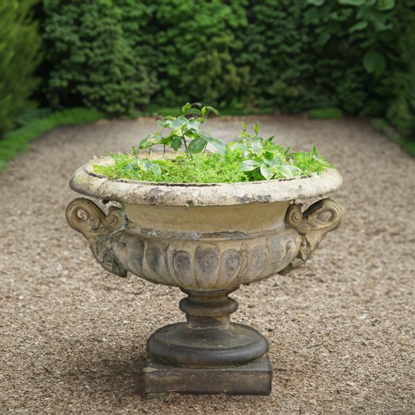 PULHMANS BROXBOURNE; A 19TH CENTURY TERRACOTTA TWIN HANDLE GARDEN URN