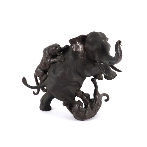 A JAPANESE PATINATED BRONZE ANIMALIER GROUP OF TIGERS ATTACKING AN ELEPHANT