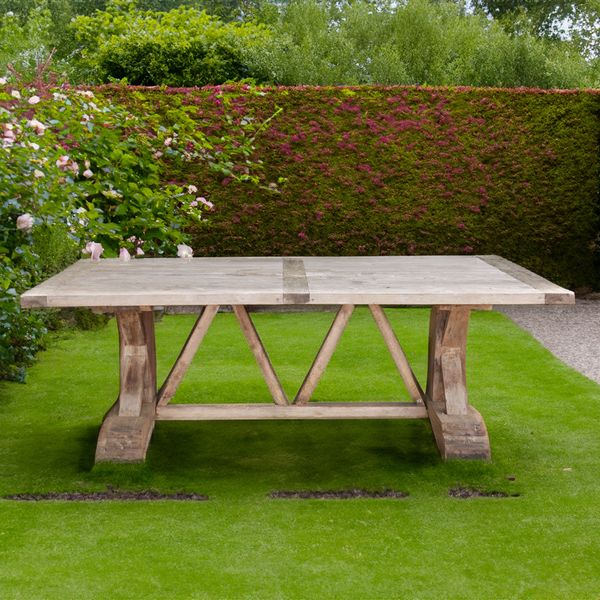 A WEATHERED TEAK RECTANGULAR KITCHEN TABLE