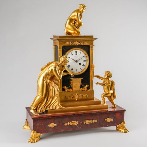 A RESTAURATION ORMOLU AND GRIOTTE MARBLE MANTEL TIMEPIECE