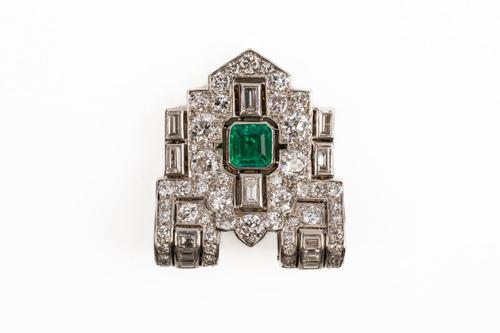 AN EMERALD AND DIAMOND DRESS CLIP
