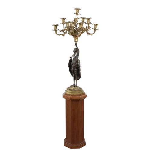 A WILLIAM IV PATINATED BRONZE AND ORMOLU NINE LIGHT CANDELABRUM