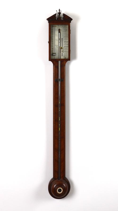 A GEORGE III WALNUT STICK BAROMETER BY CATTELY & CO, HOLBORN, LONDON