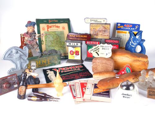 ADVERTISING INTEREST A GROUP INCLUDING A RODINE RAT DISPLAY MODEL