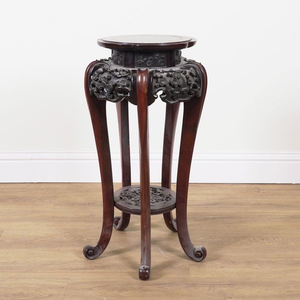 A 20TH CENTURY CHINESE EXPORT CARVED HARDWOOD JARDINIERE STAND