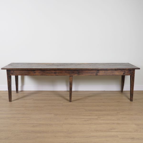 A MODERN STAINED PINE TWIN PLANK REFECTORY TABLE