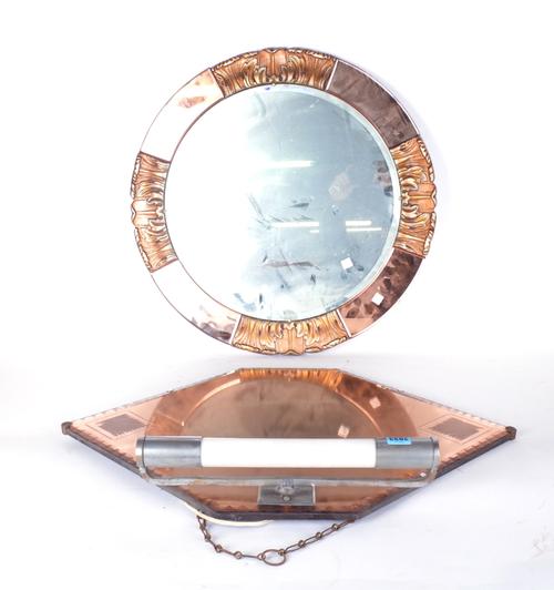 AN ART DECO WALL MIRROR OF HEXAGONAL FORM