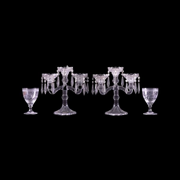 A PAIR OF GLASS THREE LIGHT CANDELABRA (4)