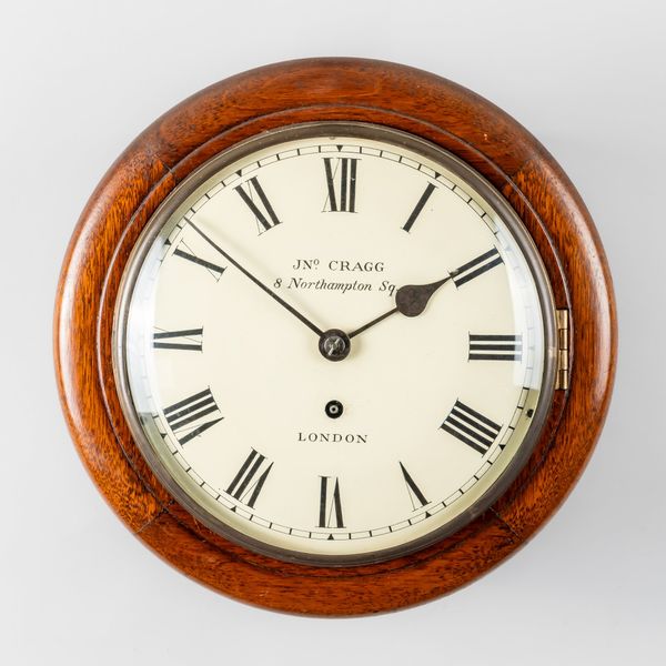 A SMALL MAHOGANY CONVEX DIAL CLOCK