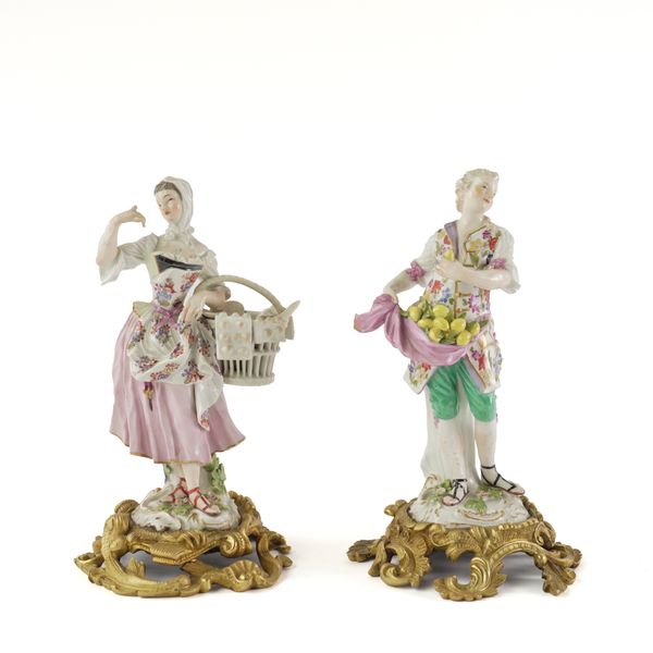 TWO MEISSEN ORMOLU-MOUNTED FIGURES OF A LEMON SELLER AND A PASTRY SELLER (2)