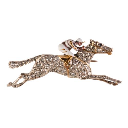 A RACEHORSE AND JOCKEY BROOCH