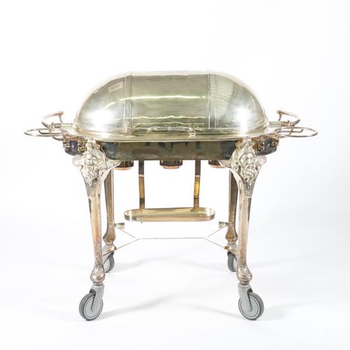 A WHITE METAL HOSTESS TROLLEY