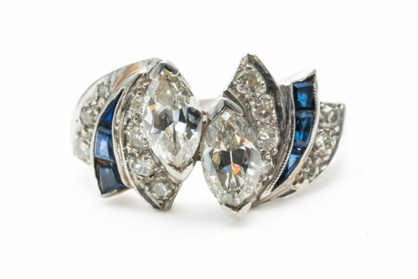 A PLATINUM, DIAMOND AND SAPPHIRE DRESS RING