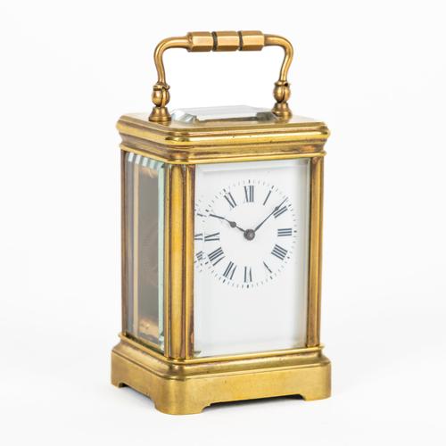 A FRENCH BRASS MINIATURE CARRIAGE TIMEPIECE