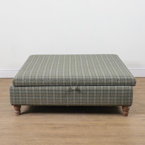 A LARGE TARTAN UPHOLSTERED SQUARE LIFT TOP FOOT STOOL