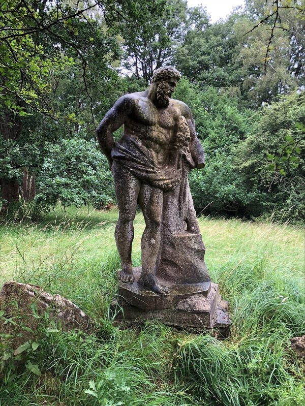 AFTER THE ANTIQUE;  A LIFE SIZE CARVED MARBLE FIGURE OF THE FARNESE HERCULES