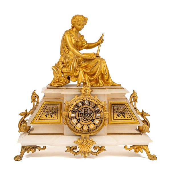 A FRENCH NEO-CLASSICAL GILT BRONZE-MOUNTED ONYX MANTEL CLOCK