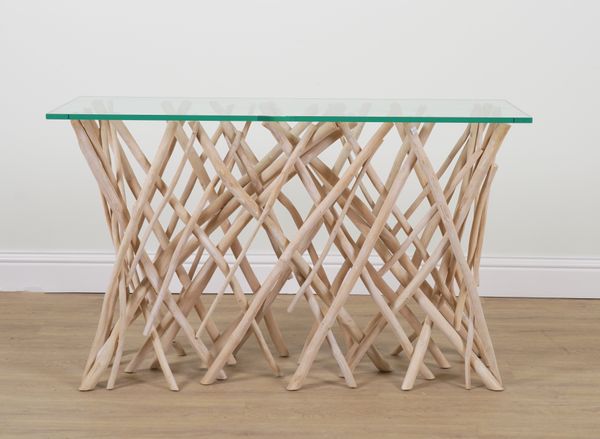 A 20TH CENTURY GLASS TOPPED DRIFT WOOD CONSOLE TABLE