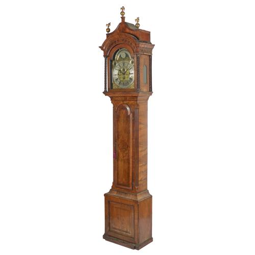 A RARE AND UNUSUAL WALNUT AND BRASS-LINE INLAID MUSICAL AND STRIKING LONGCASE CLOCK WITH MOONPHASE