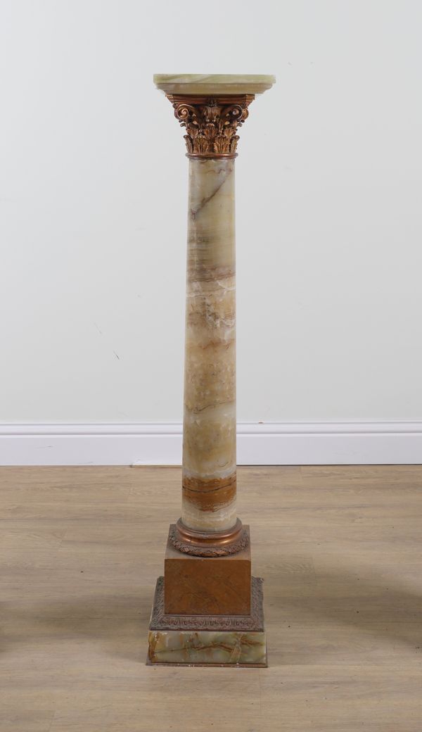 A GILT-METAL MOUNTED ONYX COLUMN