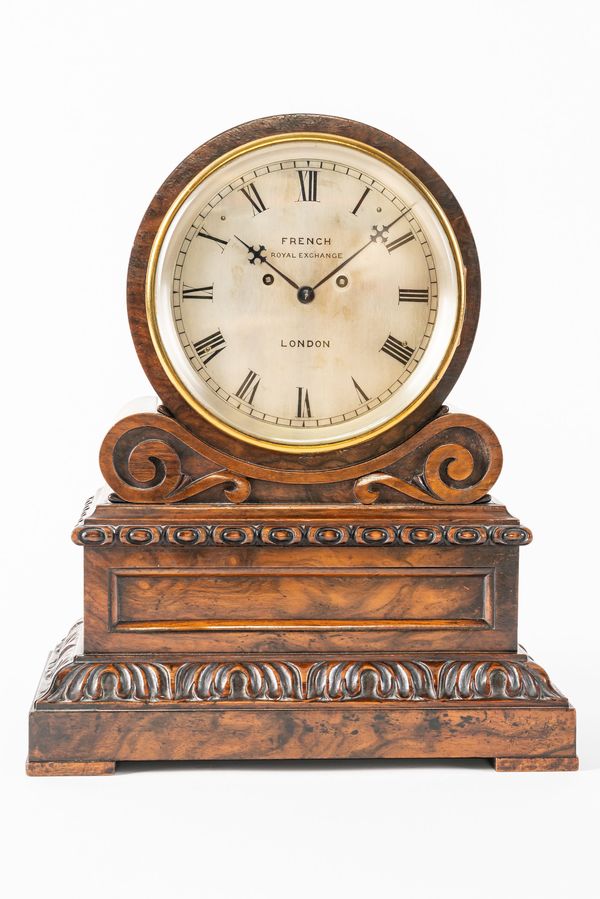 A VICTORIAN WALNUT DRUM-TOP STRIKING MANTEL CLOCK