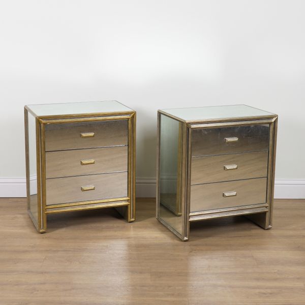 JULIAN CHICHESTER, TEMPLE RANGE; A PAIR OF MIRRORED PARCEL GILT THREE DRAWER BEDSIDE CHESTS (2)