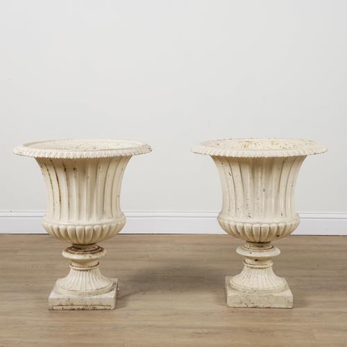 A PAIR OF EARLY 20TH CENUTRY CREAM PAINTED CAST IRON JARDINIERES (2)
