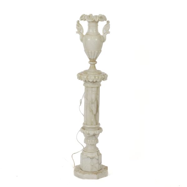 AN ALABASTER PEDESTAL URN FLOOR STANDING LIGHT
