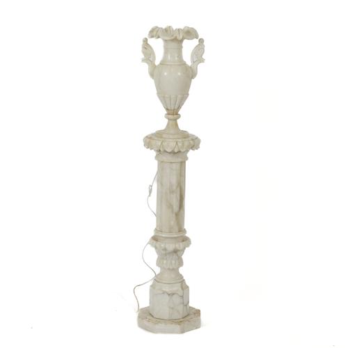 AN ALABASTER PEDESTAL URN FLOOR STANDING LIGHT
