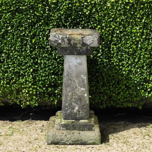 A RECONSTITUTED STONE SQUARE FIVE SECTION BIRD BATH