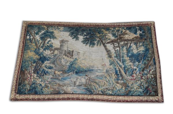 A FLEMISH VERDURE TAPESTRY DEPICTING AN AMOROUS COUPLE