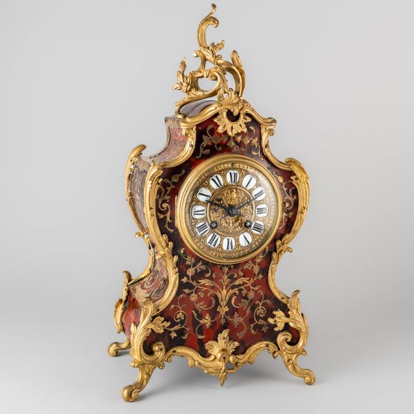 A GILTMETAL-MOUNTED BOULLE-WORK INLAID MANTEL CLOCK