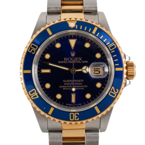 A ROLEX SUBMARINER BI-METAL BLUE DIAL AND GOLD REF: 16613