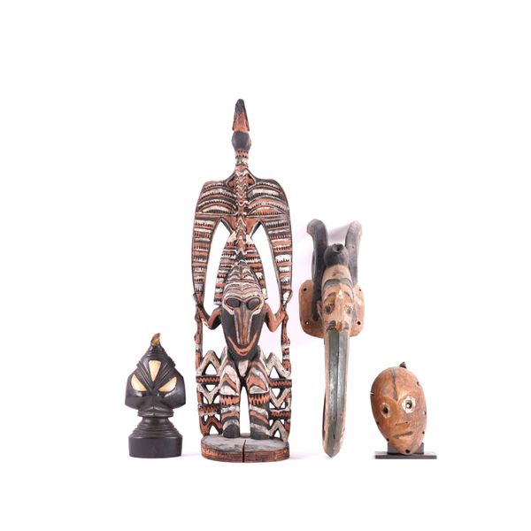 A COLLECTION OF ASSORTED TRIBAL MASKS AND FIGURES (QTY)