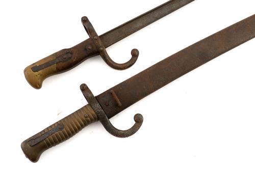 TWO ENGRAVED BAYONETS