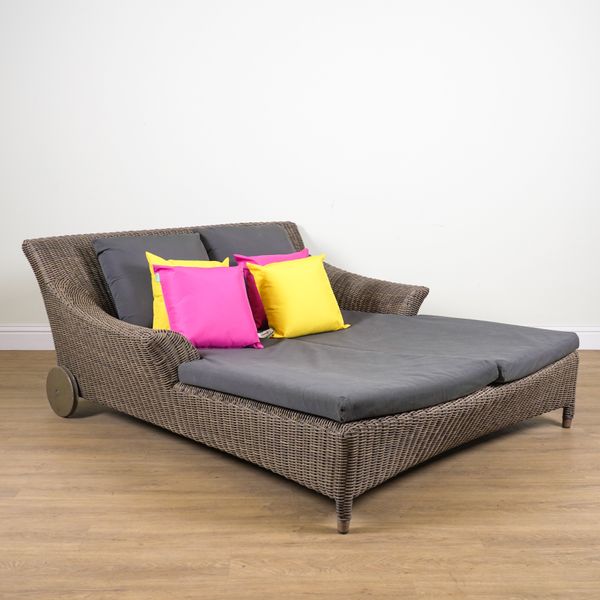 BRIDGMAN LUXURY OUTDOOR FURNITURE; A DOUBLE FAUX RATTAN GARDEN LOUNGER