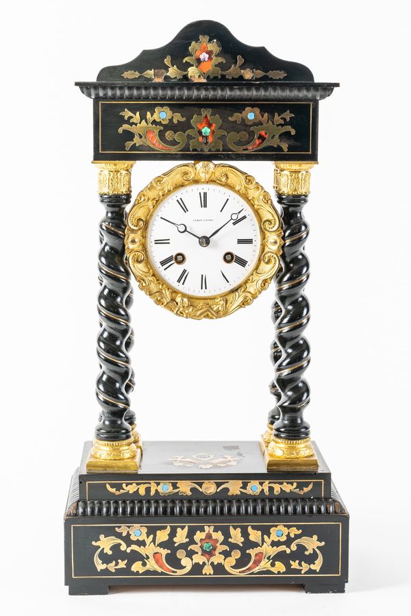 A NAPOLEON III EBONISED, CUT-BRASS INLAID AND POLYCHROME DECORATED PORTICO CLOCK